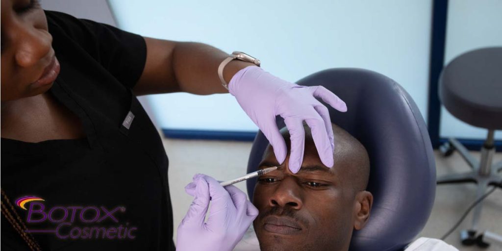 Botox for Men in Atlanta. Male Patient shown getting Botox treatment to "Elevens" area between the eyes.